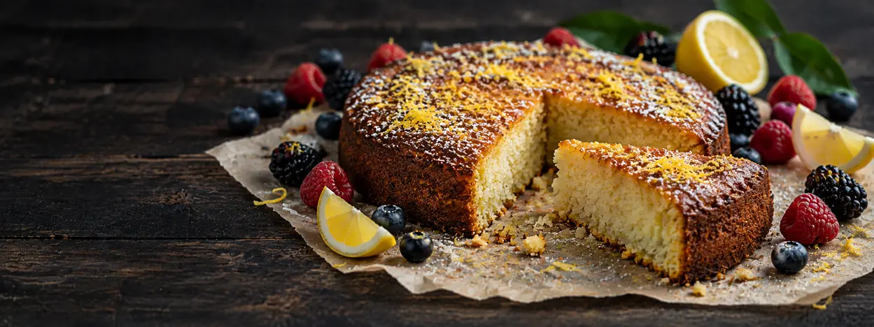 A cake and a plated slice for dessert